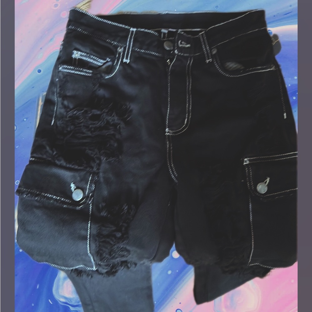 Size 26 distressed black Carmar jeans pockets